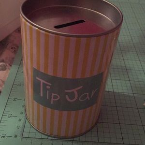 Tip jar can. Yellow and white striped